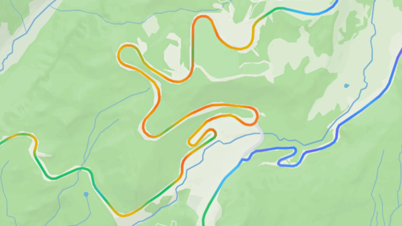 A route on the map colored by grade, with warm tones for uphill and cool tones for downhill sections.